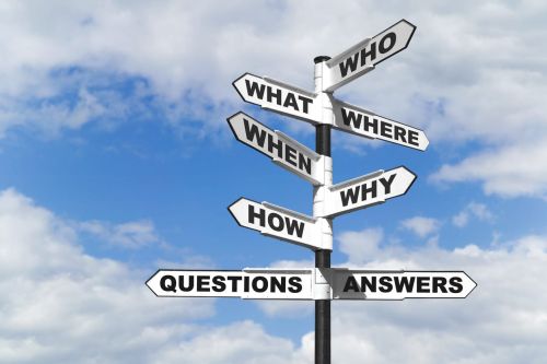 Concept image of the six most common questions and answers to ask before hiring a lawyer on a signpost.