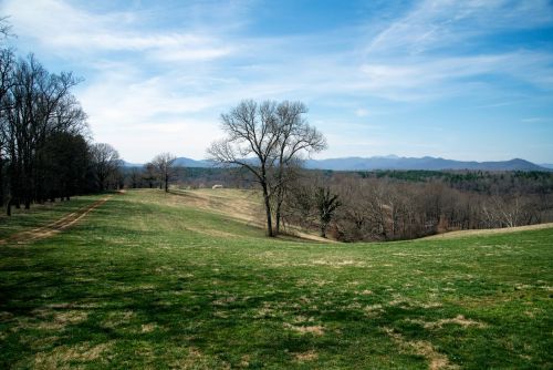 Appalachian Mountains in the distance with a dirt road for walking, Visual concept for